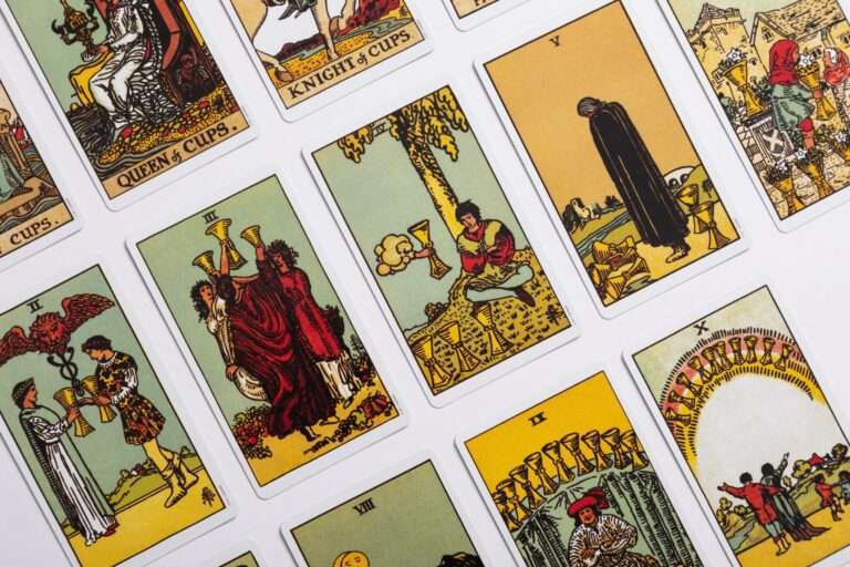 A selection of Tarot Cards laid out across a desk neatly, for an article by Janine White for Houghton & Mackay