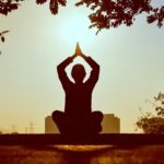 Person doing Yoga by Prasanth Inturi