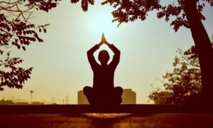 Person doing Yoga by Prasanth Inturi