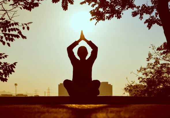 Person doing Yoga by Prasanth Inturi
