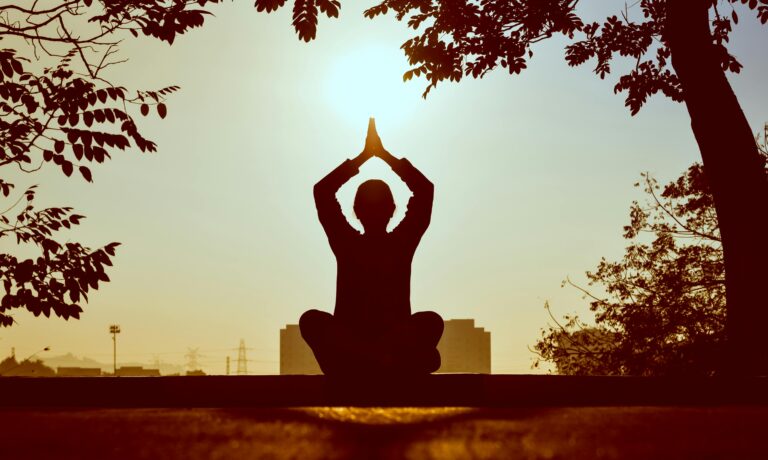 Person doing Yoga by Prasanth Inturi