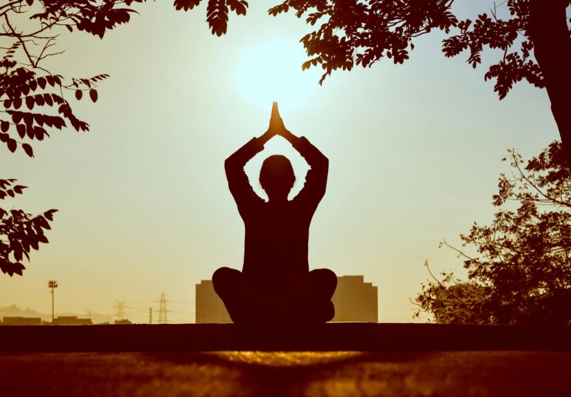 Person doing Yoga by Prasanth Inturi