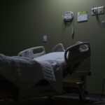 A hospital bed in surreal settings.