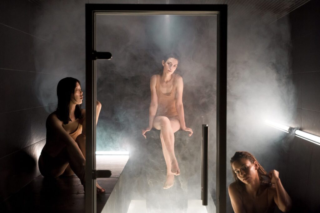 Three girls in a Sauna
