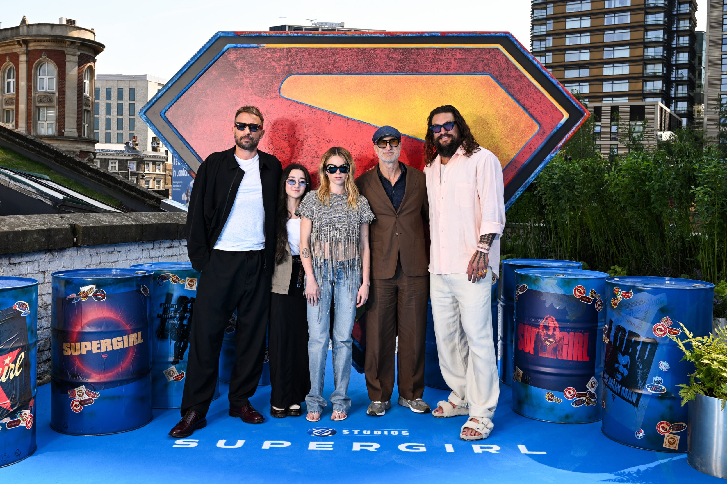 LONDON, ENGLAND - JUNE 19: (L-R) Matthias Schoenaerts, Eve Ridley, Milly Alcock, Craig Gillespie and Jason Momoa attend the London photocall of Supergirl at the Village Underground on June 19, 2026 in London, England. (Photo by Jeff Spicer/Getty Images for Warner Bros.)